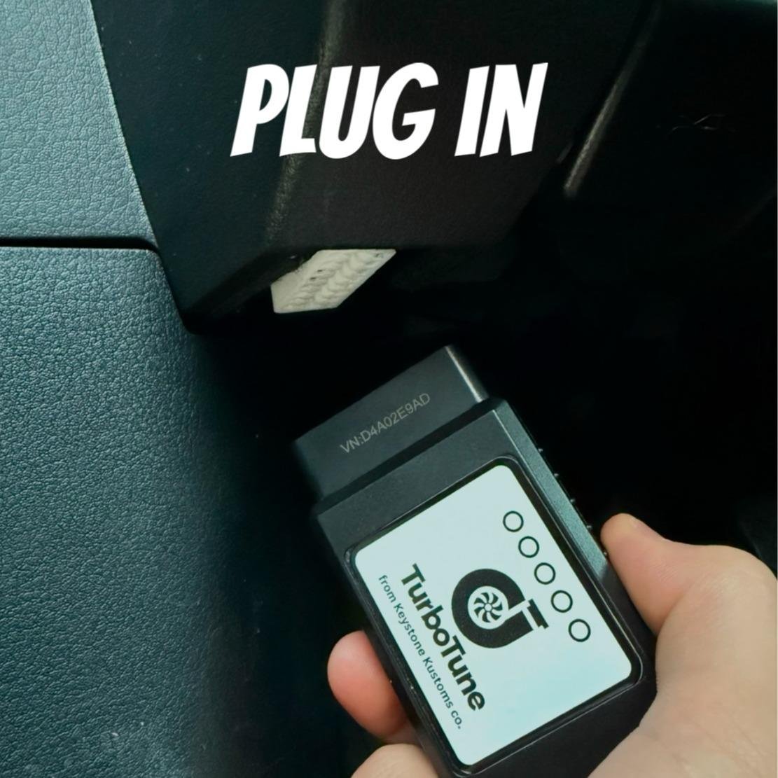 TurboTune being plugged into a car's OBD2 port